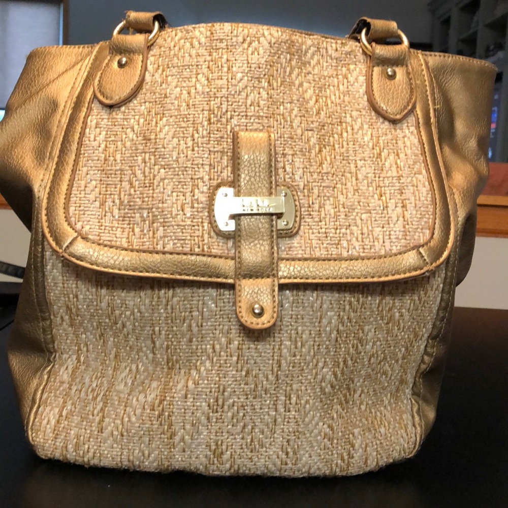 Nicole Miller gold/twill shoulder bag.